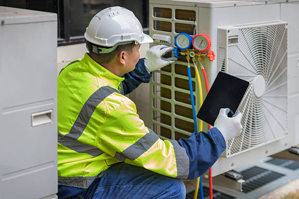 Professional Ac Installation technician working in Harlan, IA